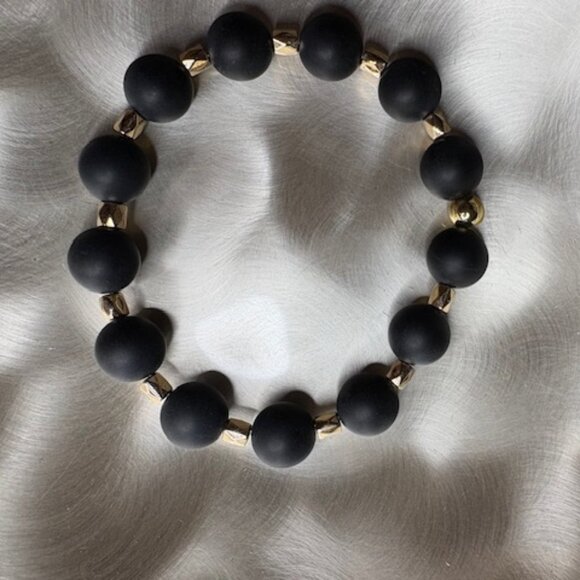 bold and modern bracelet with matte black round beads and gold spacers - Picture 3 of 3